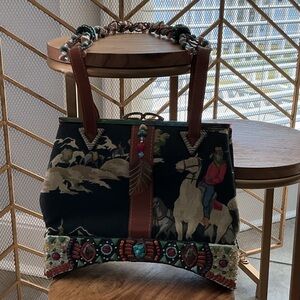 Mary Frances Black Embroidered Western Saddle Bag with Brown Trim